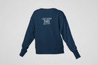 Navy crewneck sweatshirt back with "I got gifted this" text at center
