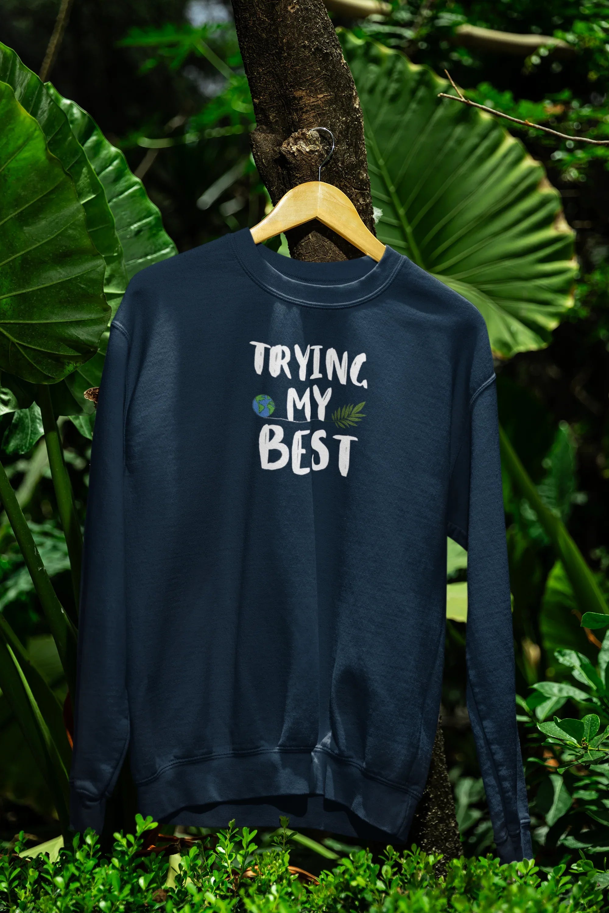 Deep teal crewneck sweatshirt with "Trying My Best" text graphic on the front