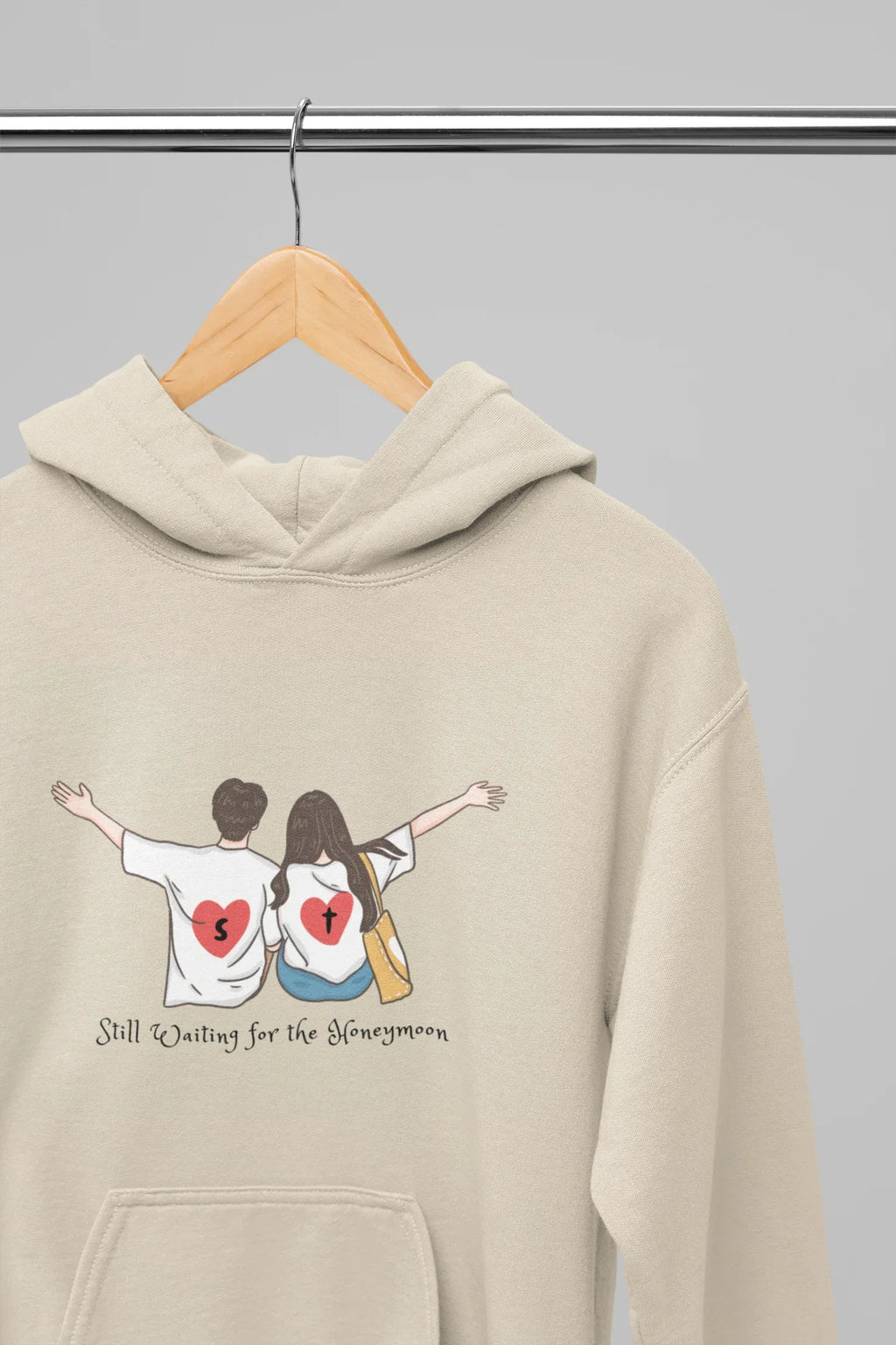 Sand pullover hoodie with drawstring hood and couple graphic on front