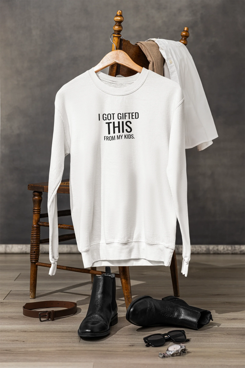 White crewneck sweatshirt with "I got gifted this" and "from my kids" chest print