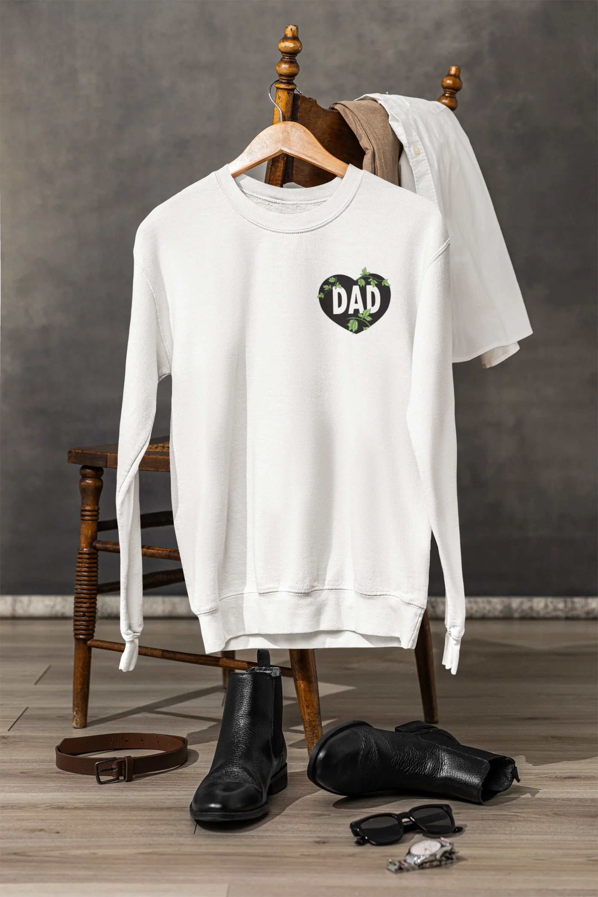White crewneck sweatshirt with DAD heart logo on chest