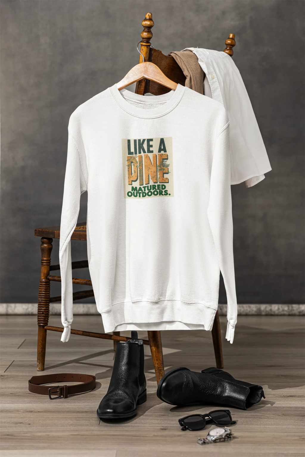 White sweatshirt with front crew neck and “Like a Pine” square logo print