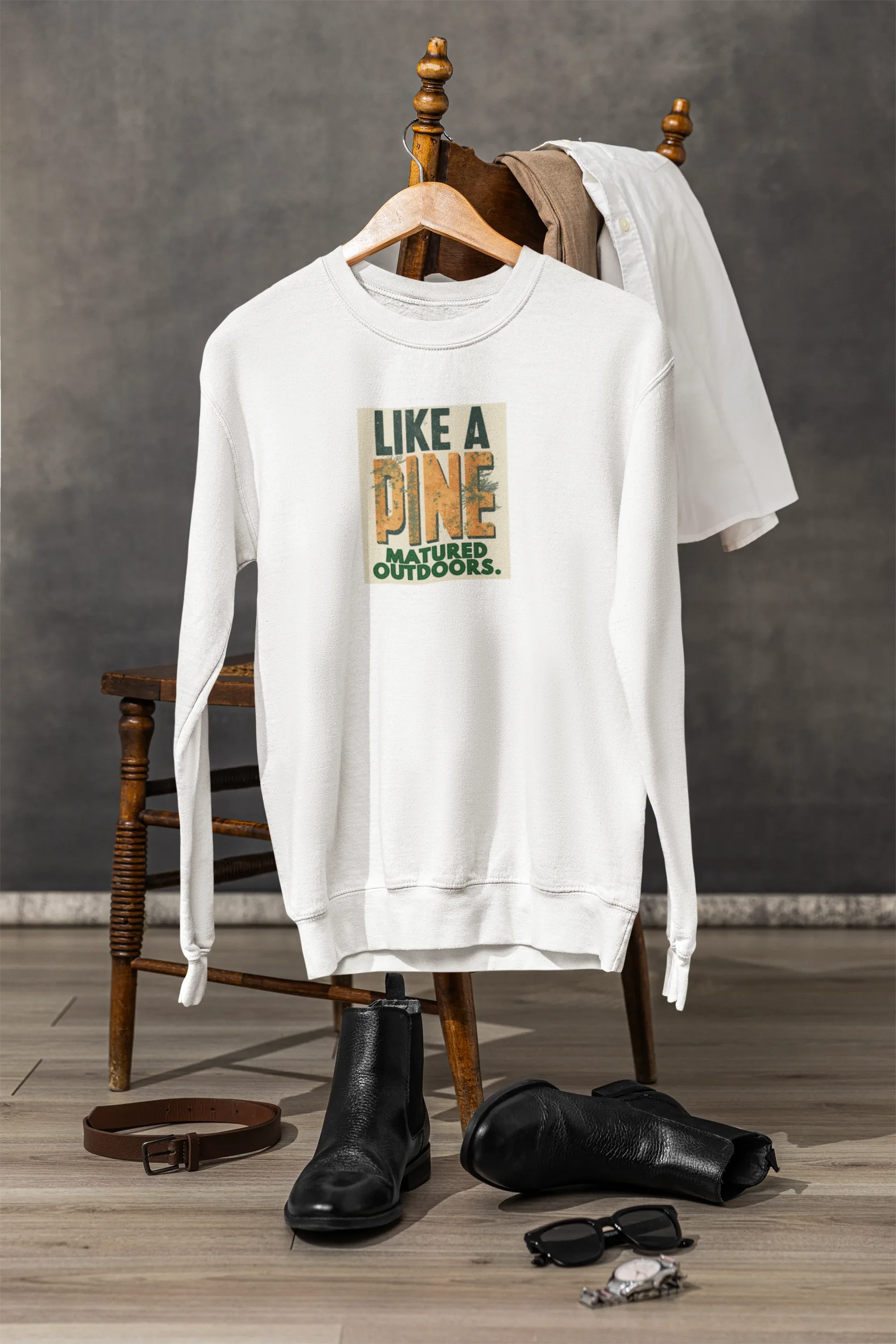 White sweatshirt with front crew neck and “Like a Pine” square logo print