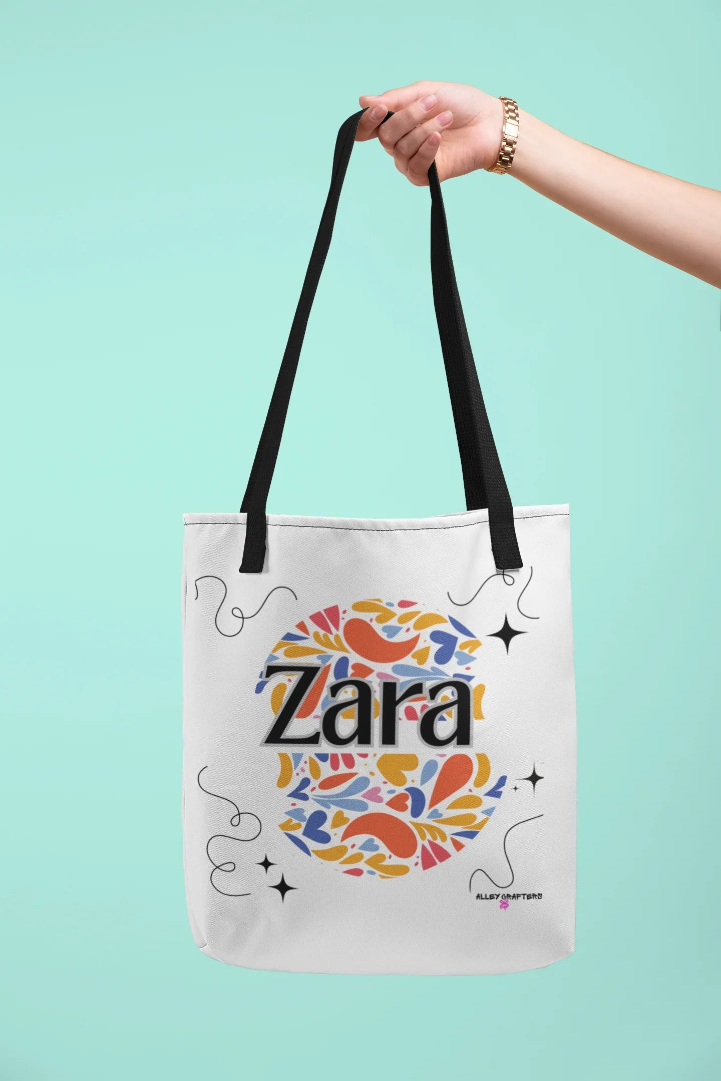 Personalized floral tote bag, white with black handles and “Zara” heart graphic.