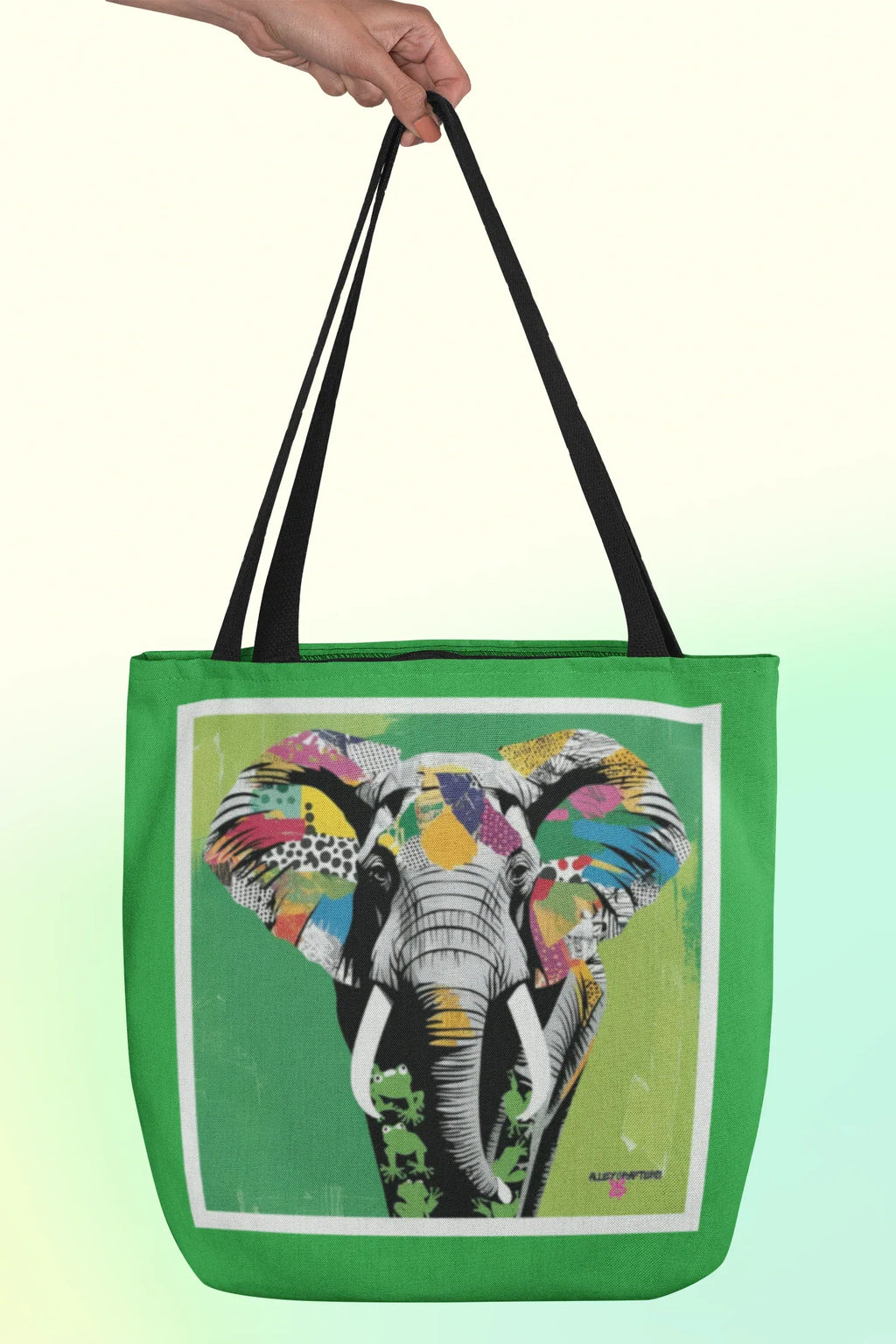 Green tote bag with elephant pop art image and black double top handles