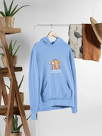 Light blue hooded sweatshirt hanging, with front pocket and chest graphic