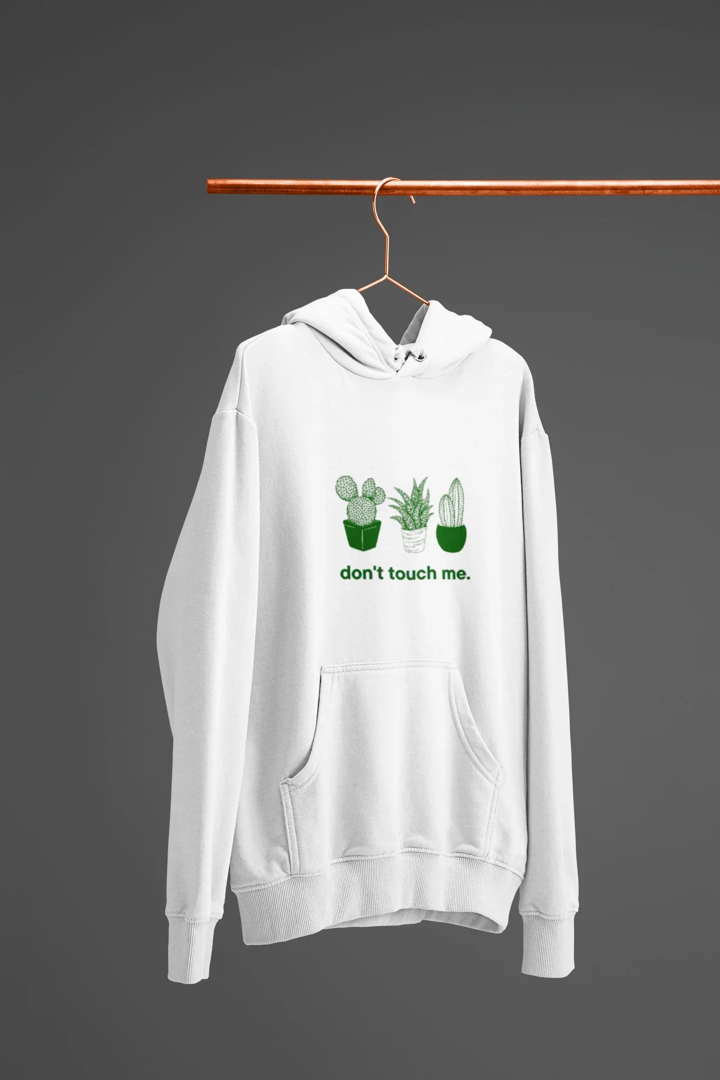 White hoodie with cactus graphic and “don’t touch me.” text above the front pocket