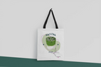 White tote bag with black base straps and matcha drink print on front