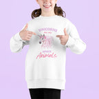 Kids white sweatshirt with unicorn face and "Spirit Animals" text graphic