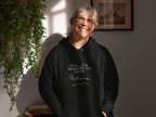 Black hooded sweatshirt with front pocket and 'Future' logo graphic