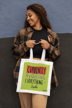 White canvas tote with lime green front panel and 'Currently Avoiding Everything-' text, Sophie