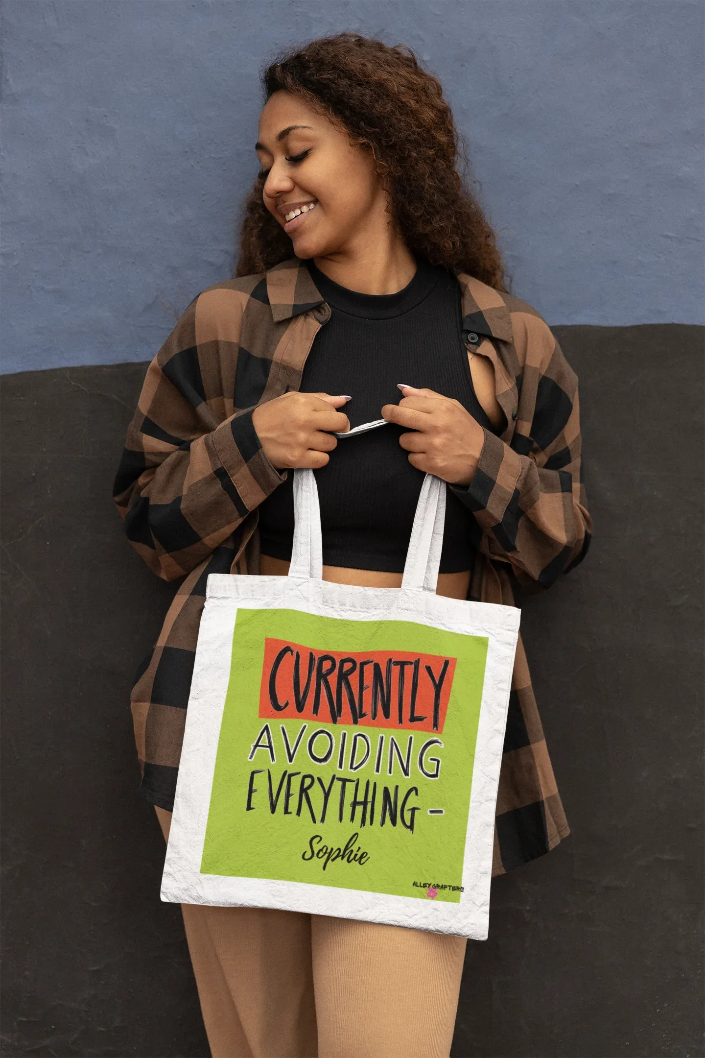 White canvas tote with lime green front panel and 'Currently Avoiding Everything-' text, Sophie