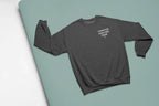 Gray heather crewneck sweatshirt with front text graphic “I SURVIVED ANOTHER YEAR”
