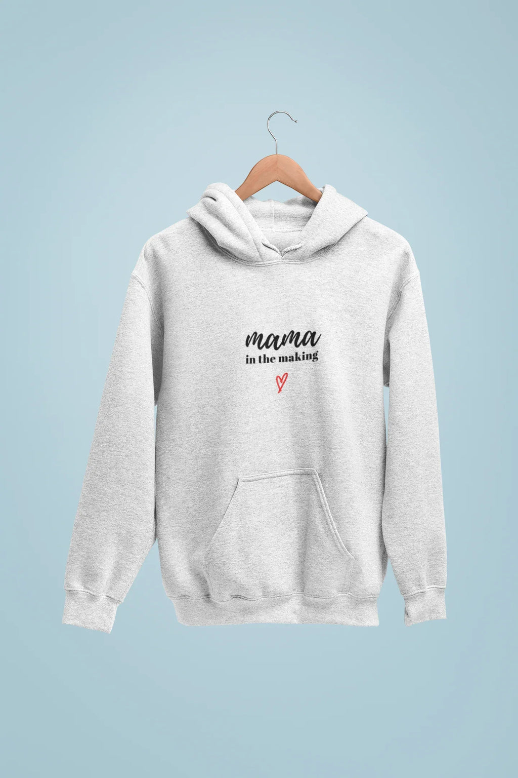 Heather gray hooded sweatshirt on hanger with 'mama in the making' print