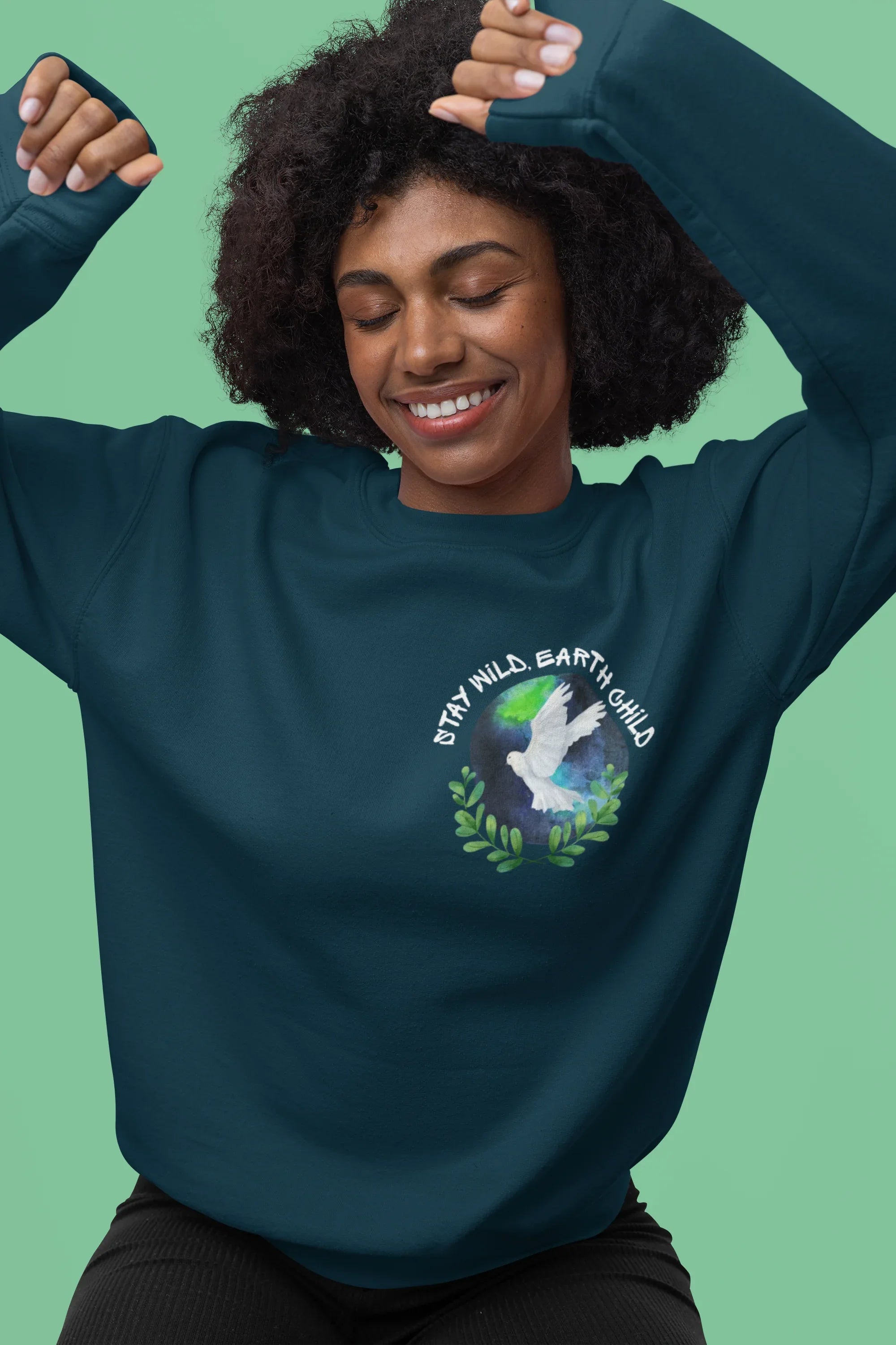 Teal sweatshirt with dove nature logo printed on chest, crew neck, long sleeves