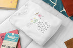 Arctic white kids sweatshirt with 'I'm Not Tired, You're Tired' character graphic