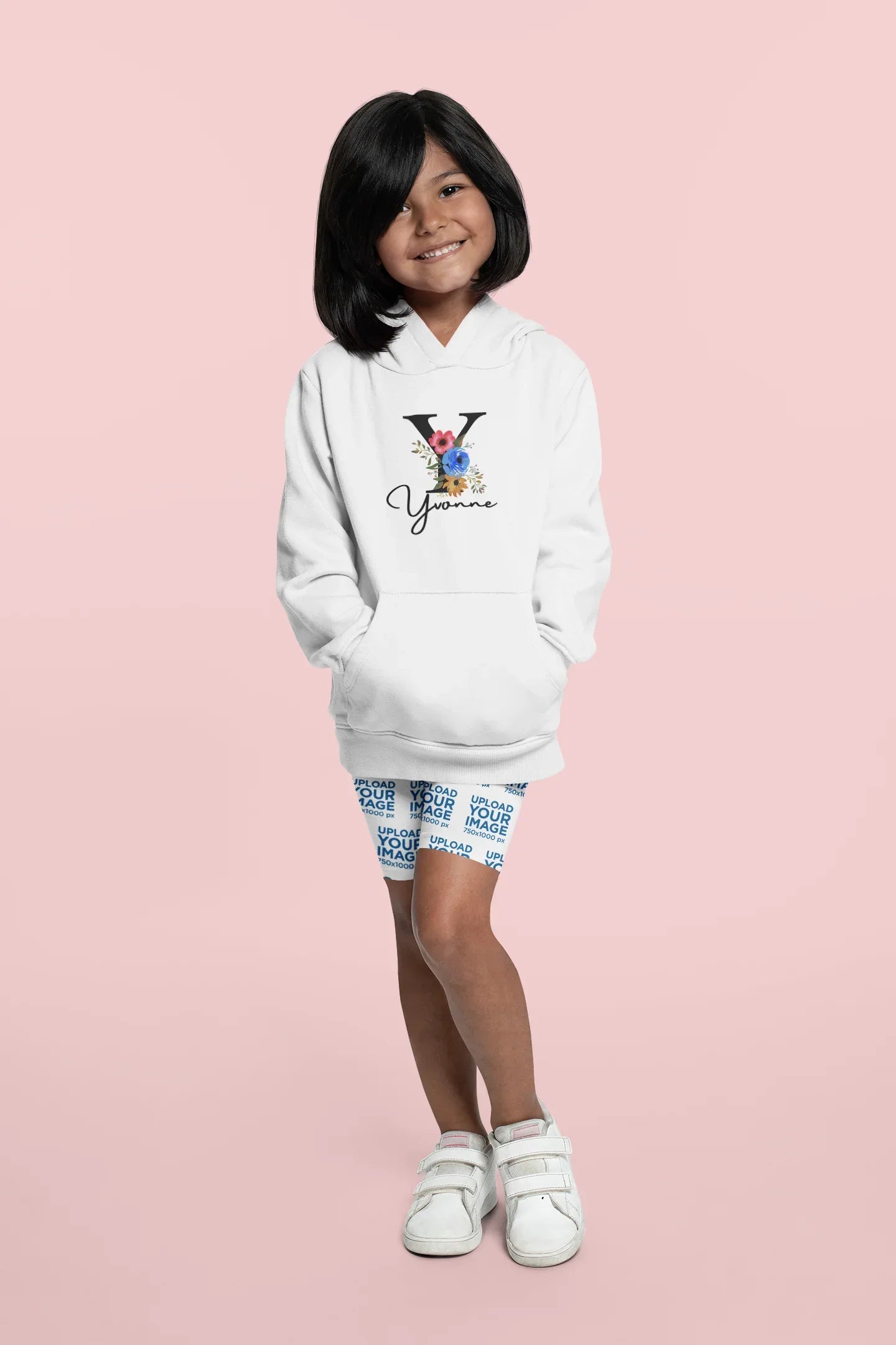 White kids hoodie on a child, floral letter and script name graphic on front