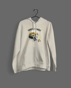 White hooded sweatshirt on hanger with front graphic skull and flower design, drawstring hood and pocket.