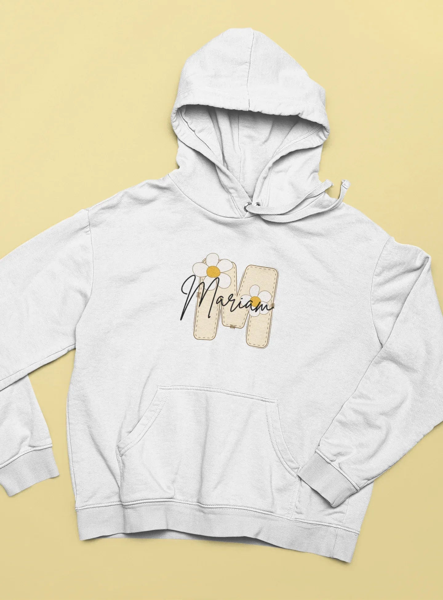 Kids white hoodie with hood and front pocket, floral name graphic and drawn details