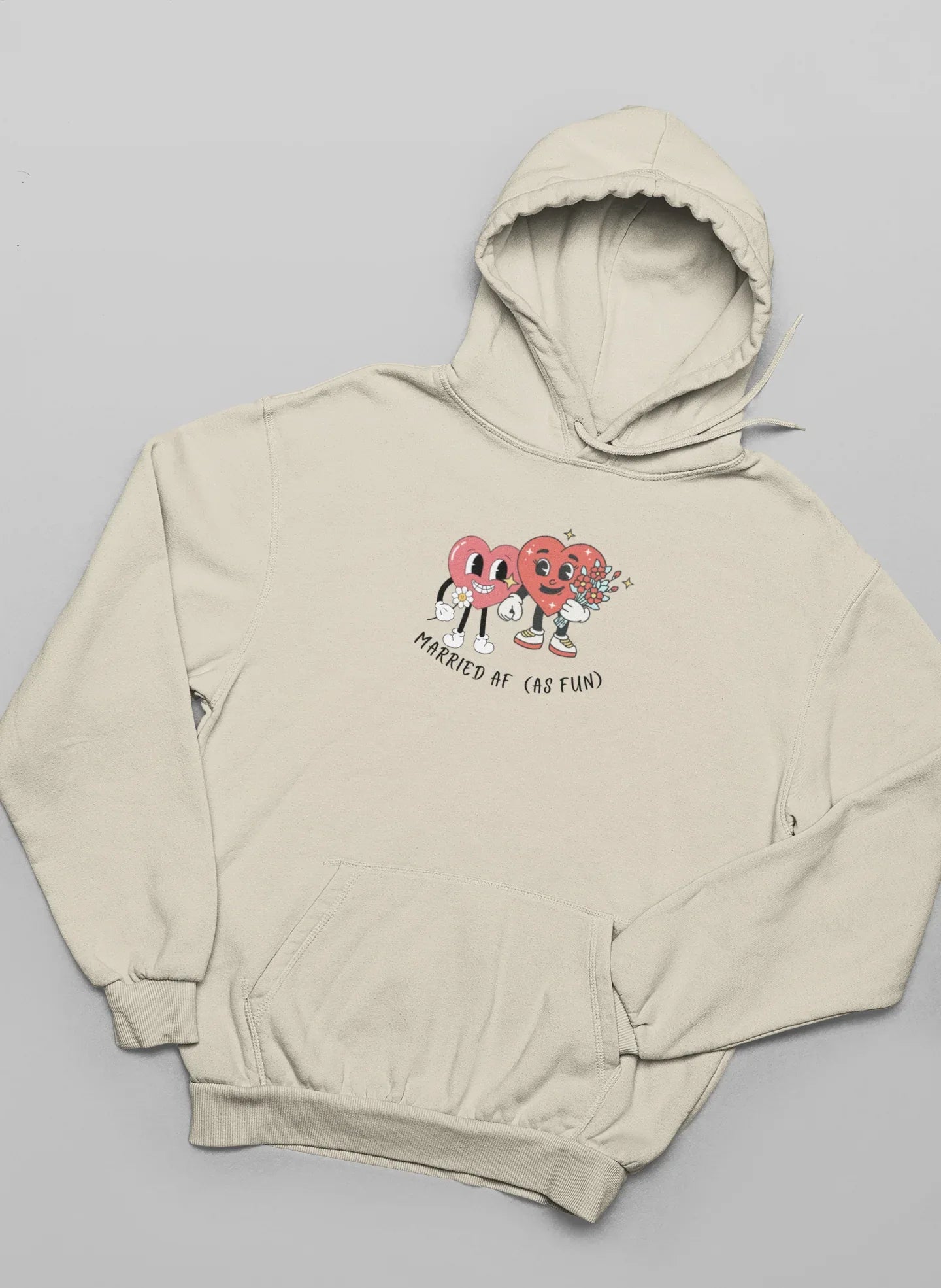 Sand beige hoodie sweatshirt with small heart cartoon graphic on chest