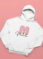 White kids hooded sweatshirt with pink donut graphic and name text at the center chest.