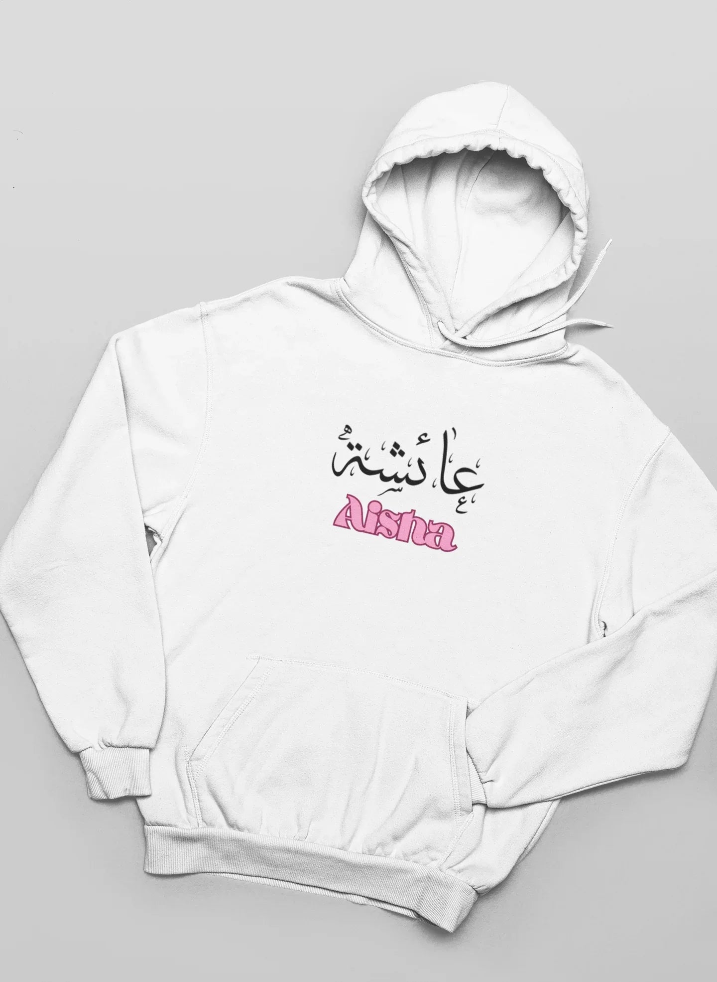 Kids white pullover hoodie with Arabic name and pink “Aisha” chest print