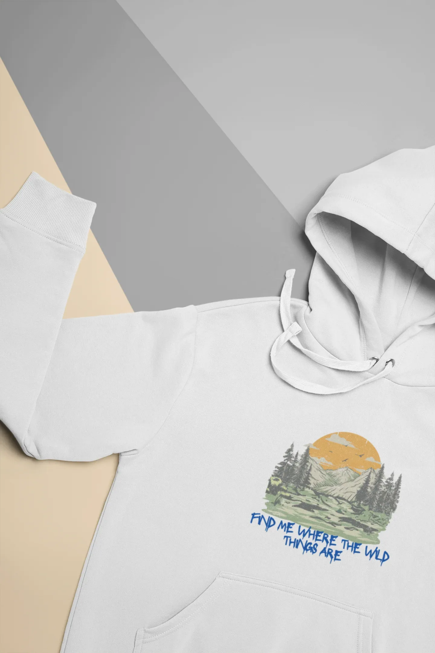 White hoodie close-up with hood and sleeve cuff, featuring mountain forest graphic