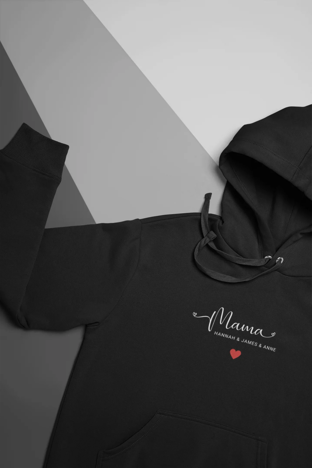 Black hooded sweatshirt with drawstrings, “Mama” print and red heart