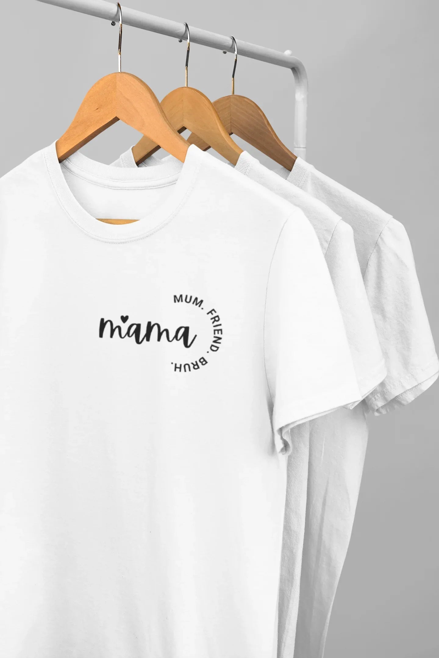 White Mama T-shirt on wooden hangers, small chest 'mama' logo, crew neck