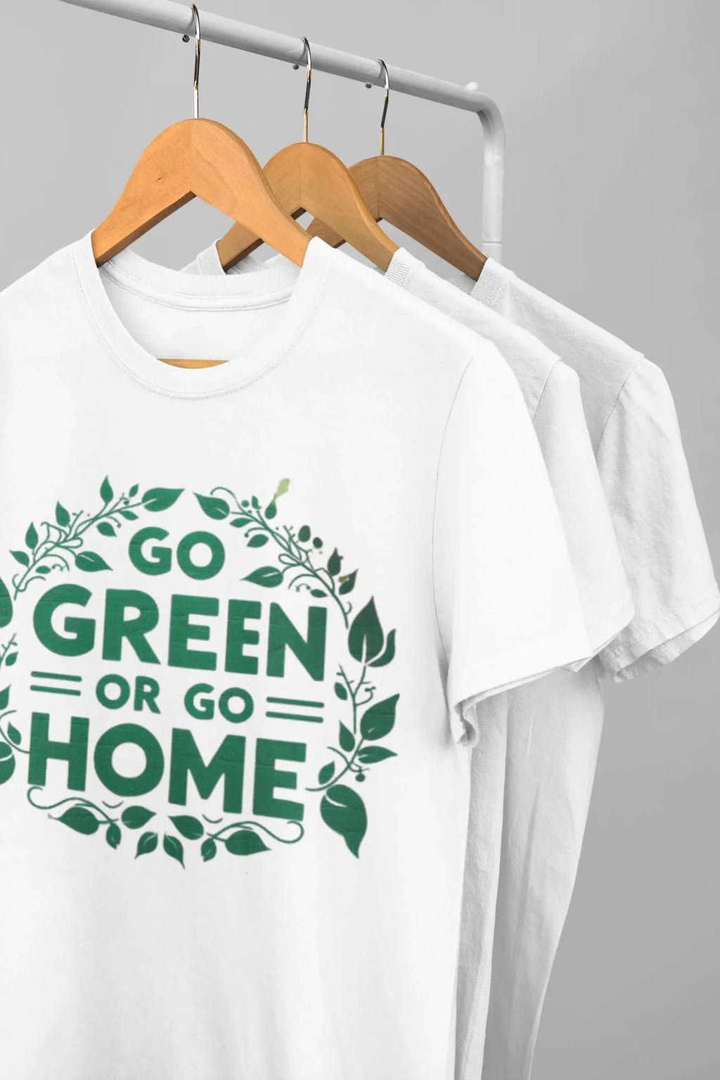 White unisex T-shirt with front graphic print reading "GO GREEN OR GO HOME"