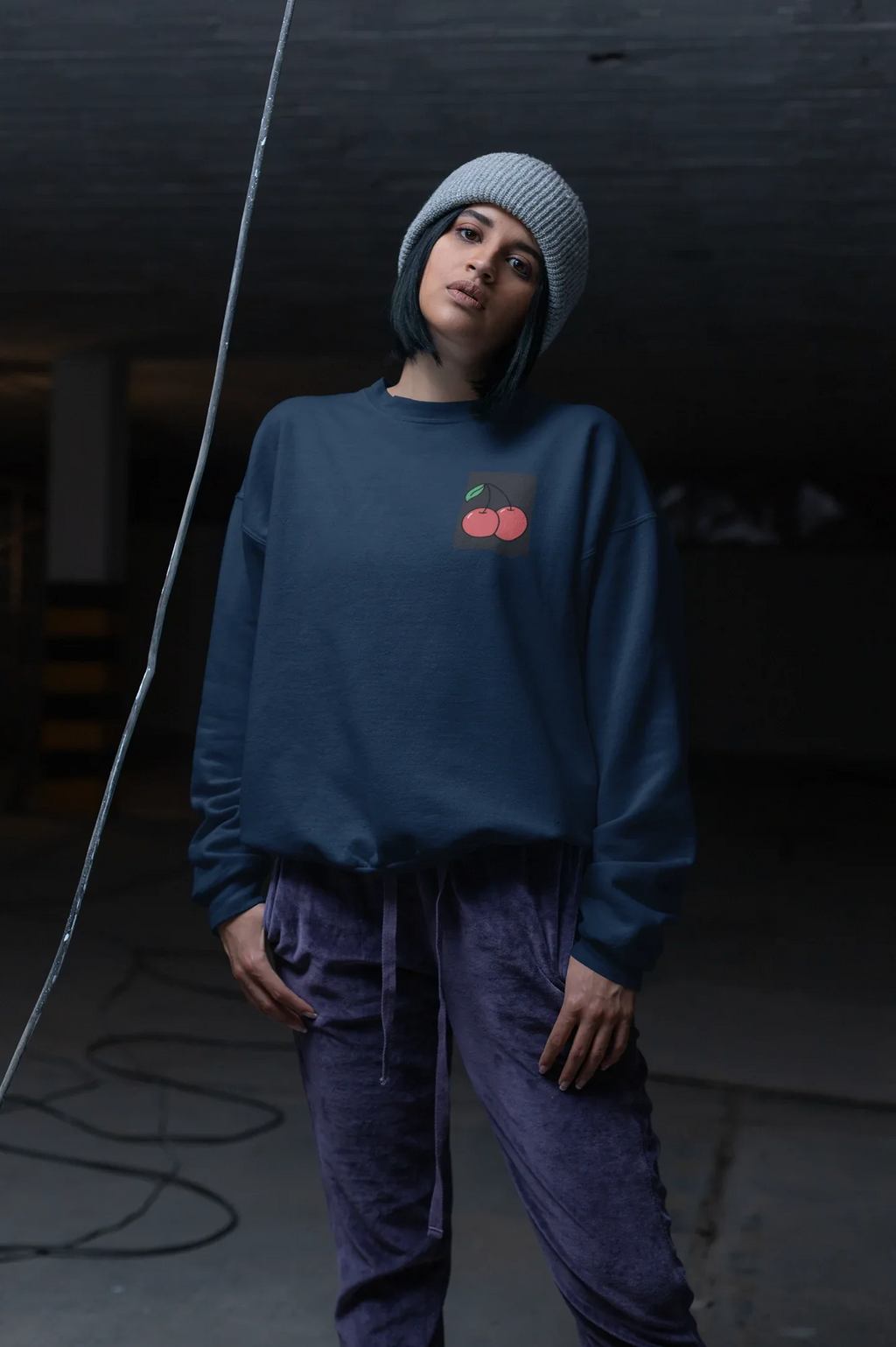 Navy crewneck sweatshirt with cherry embroidery on the left chest