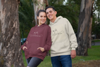 Maroon and cream unisex hoodies worn by two people, front line-art wedding graphic