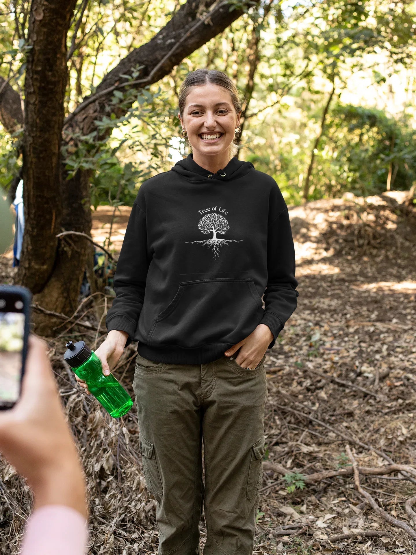 Black hoodie sweatshirt with Tree of Life tree graphic and front kangaroo pocket