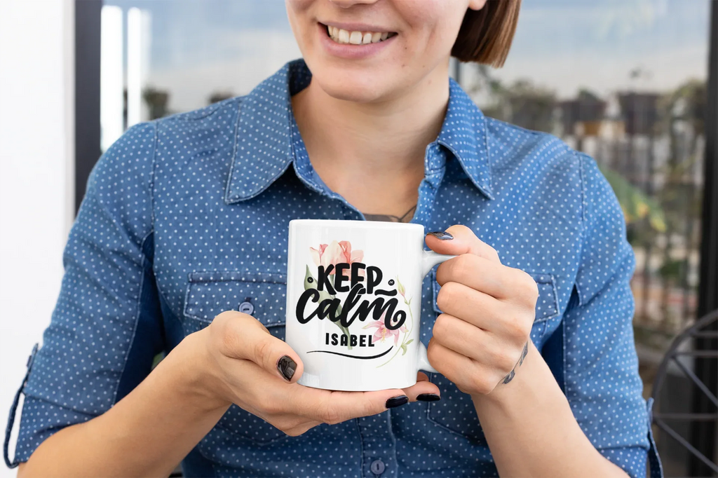 White ceramic mug with Keep Calm floral design and name "ISABEL" on front.