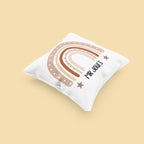 White pillowcase with rainbow arch graphic, stars, and personalized text