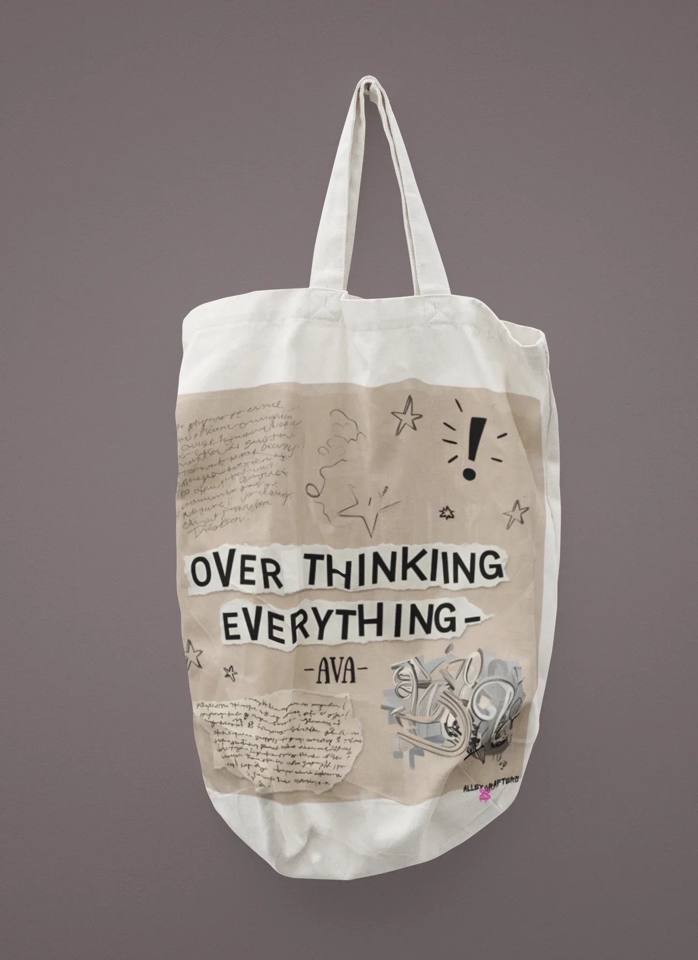 White tote bag with long handles and printed quote 'OVER THINKING EVERYTHING'