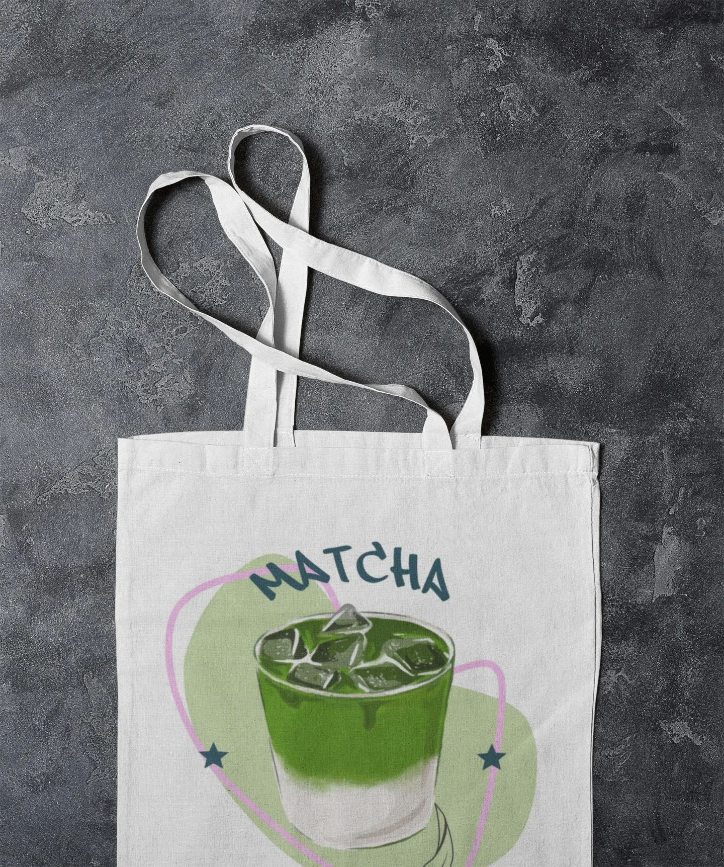 White tote bag with “MATCHA” graphic and wide white straps