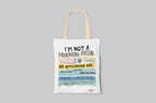 White canvas tote bag with printed “or afternoon one” slogan