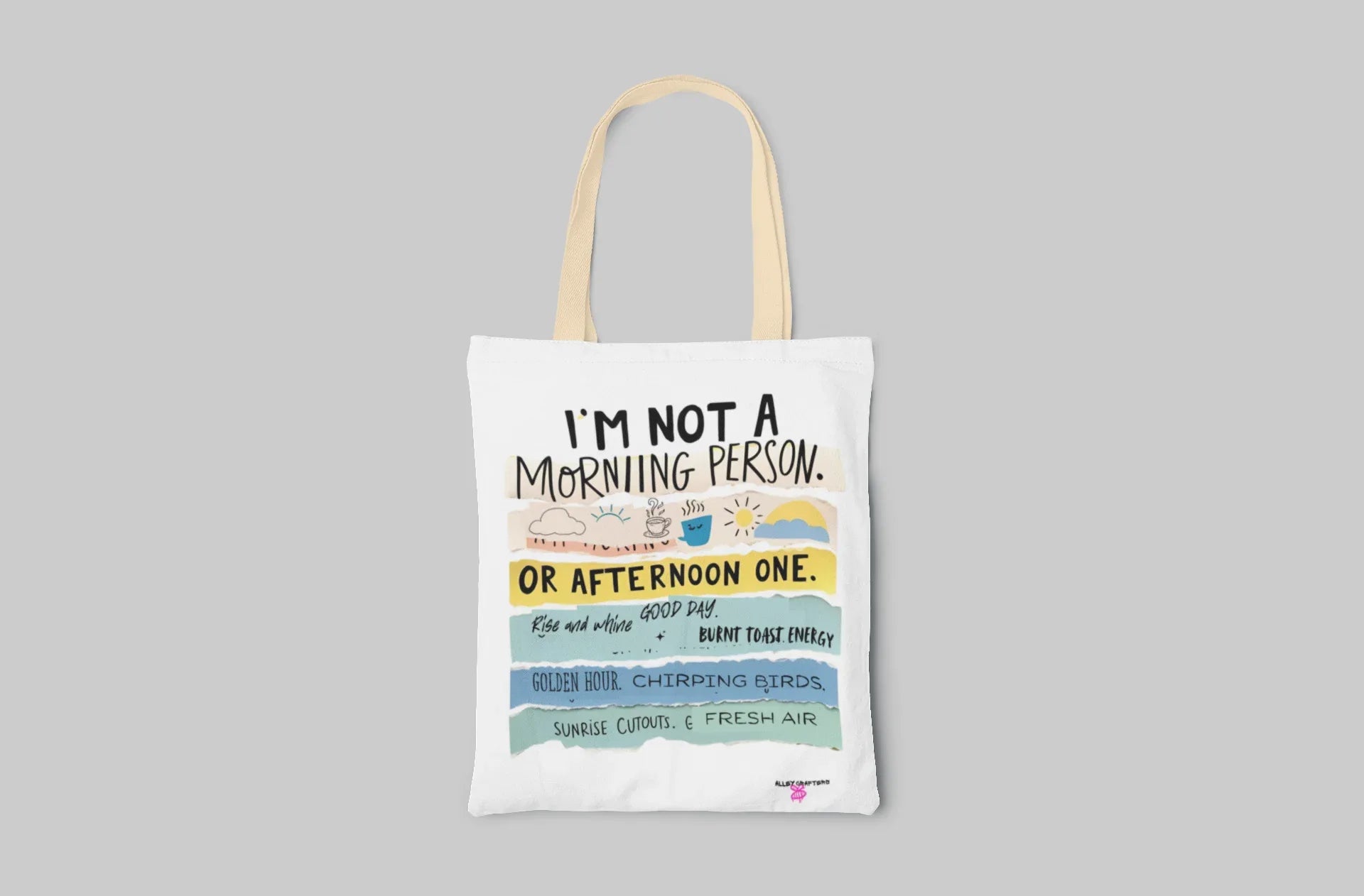 White canvas tote bag with printed “or afternoon one” slogan