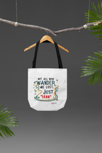 White canvas tote bag with short top handles and colorful front quote graphic