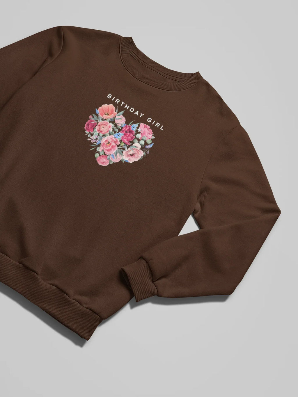 Dark brown sweatshirt with “BIRTHDAY GIRL” text and floral heart graphic