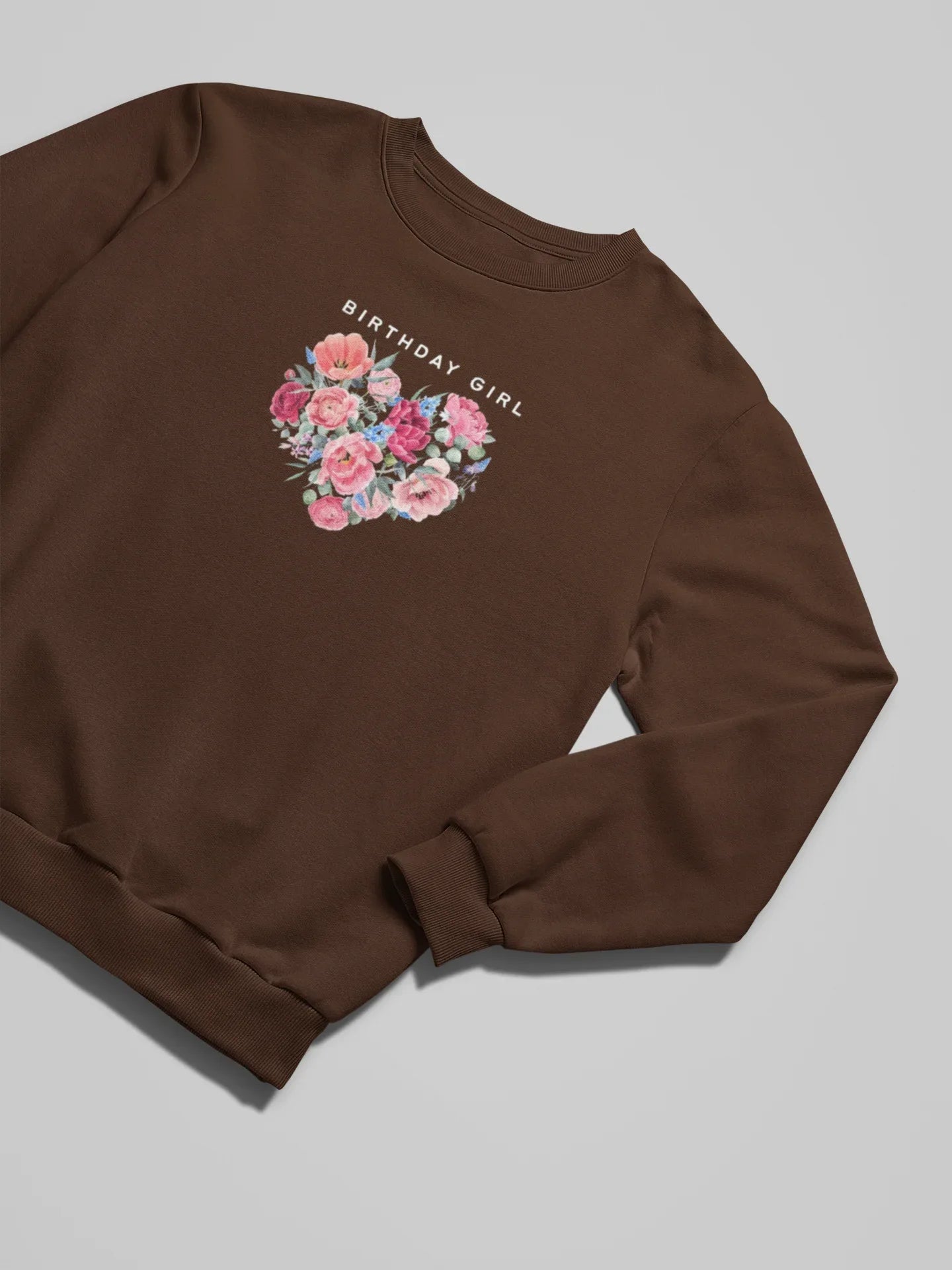 Dark brown sweatshirt with “BIRTHDAY GIRL” text and floral heart graphic