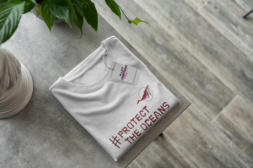 White T-shirt with #PROTECT THE OCEANS print and small bird graphic