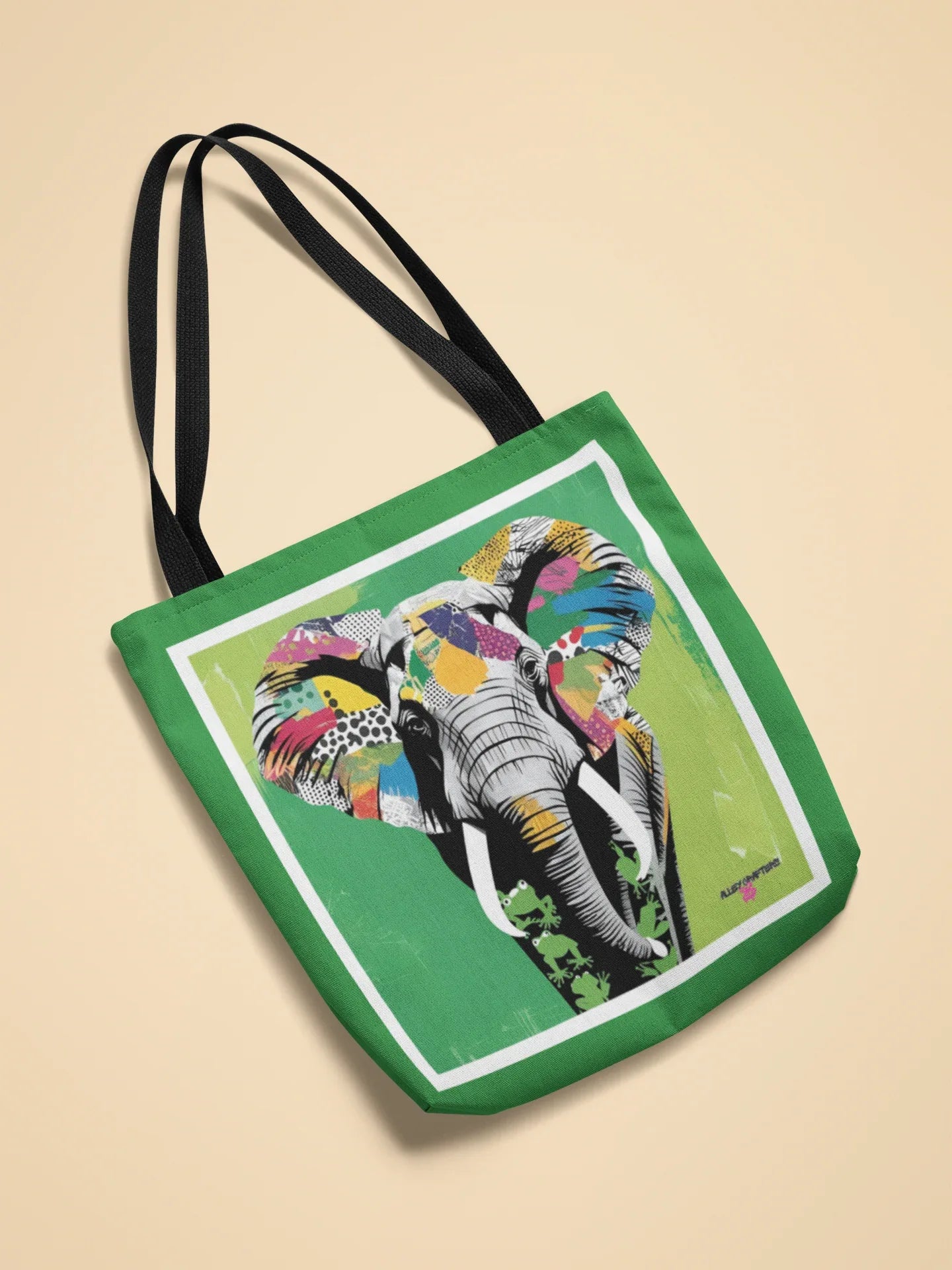 Green tote bag with black handles and colorful elephant pop art panel
