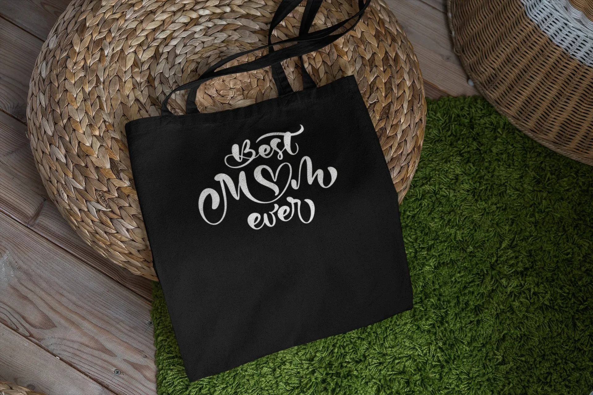 Black canvas tote bag with “Best Mum ever” white lettering on front, top handles