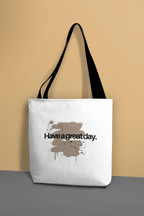 White canvas tote bag with black handles, “Have a great day.” splash graphic