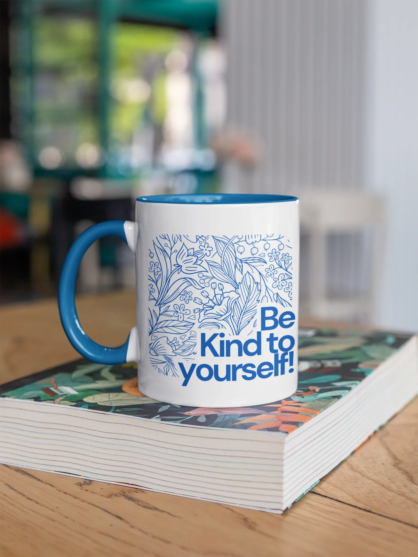Navy accent coffee mug with blue floral line art and 'Be Kind to yourself!' text