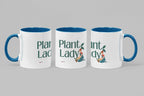 Set of three white ceramic coffee mugs with blue handles and Plant Lady graphic