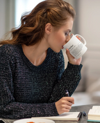 White ceramic teacher mug drinking cup, 'teacher' text and quote visible