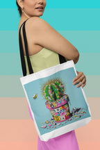 Tote bag with cactus artwork, light blue panel, black shoulder straps